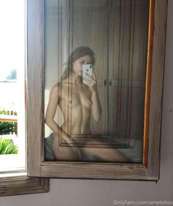 This is a more artful take on the "Mirror Selfie". I was sit..