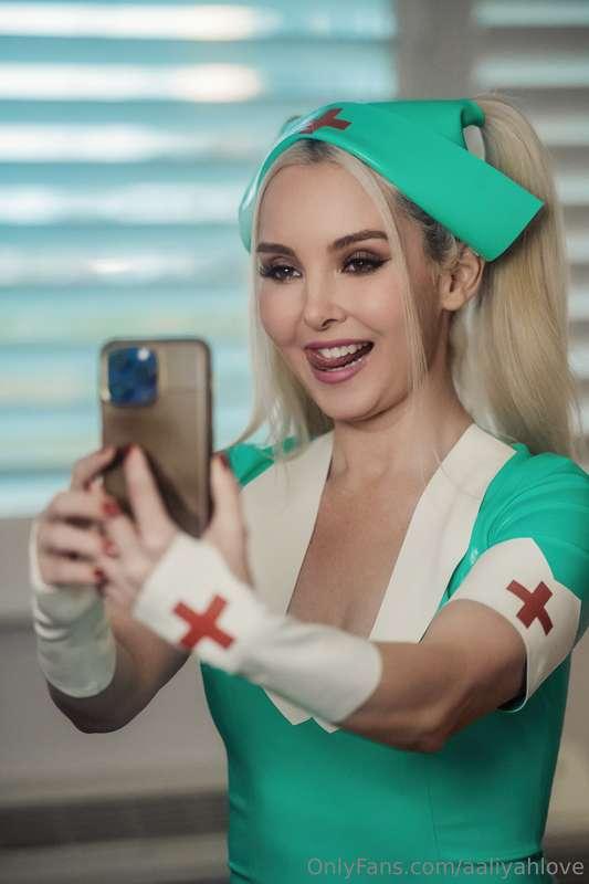 So I have a set of 60 pictures of me wearing a latex nurse c..