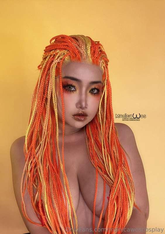 Feeling bold with my orange box braids and hottest bikini Do..