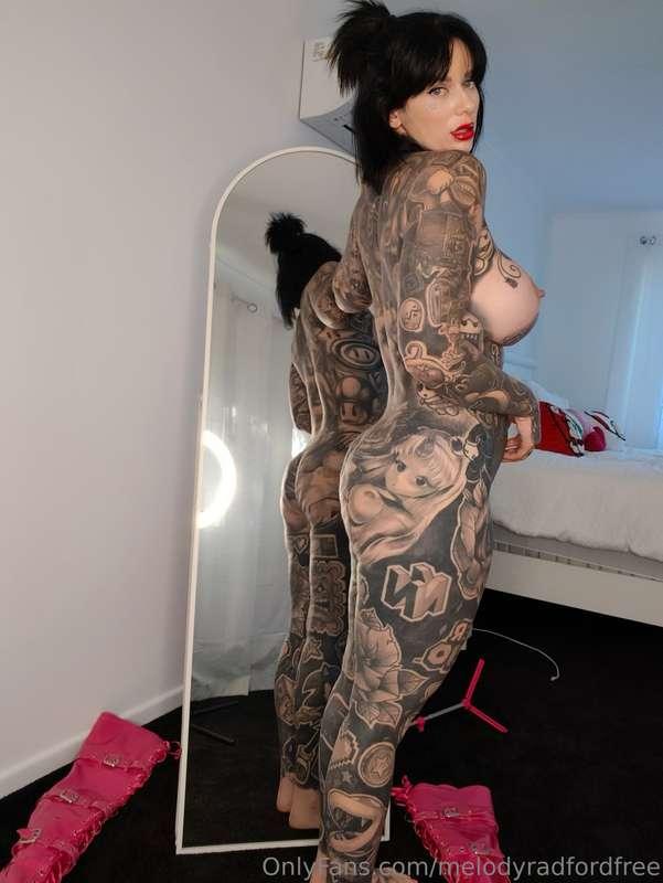 Huge set of nudes in pink leather thigh high boots. On the b..