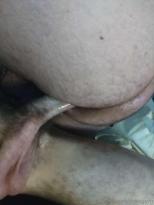 A well dilated ass with a cock deep inside
