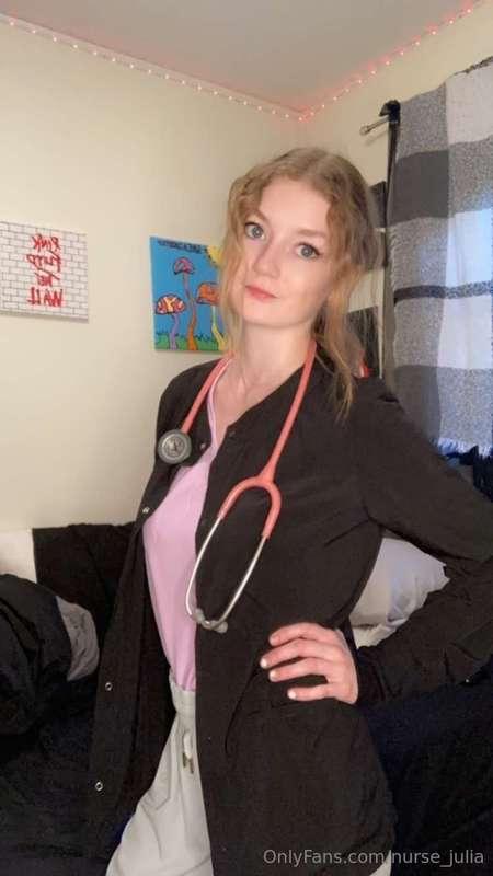 Posing in my scrubs and wearing stethoscope around my neck👩‍..