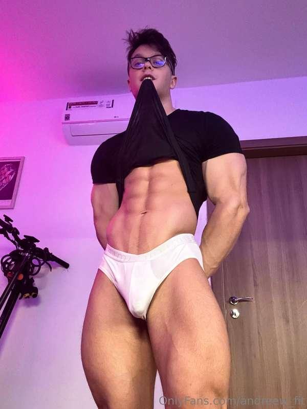 Shirt between my teeth, abs on show, cock hard in my brief… ..