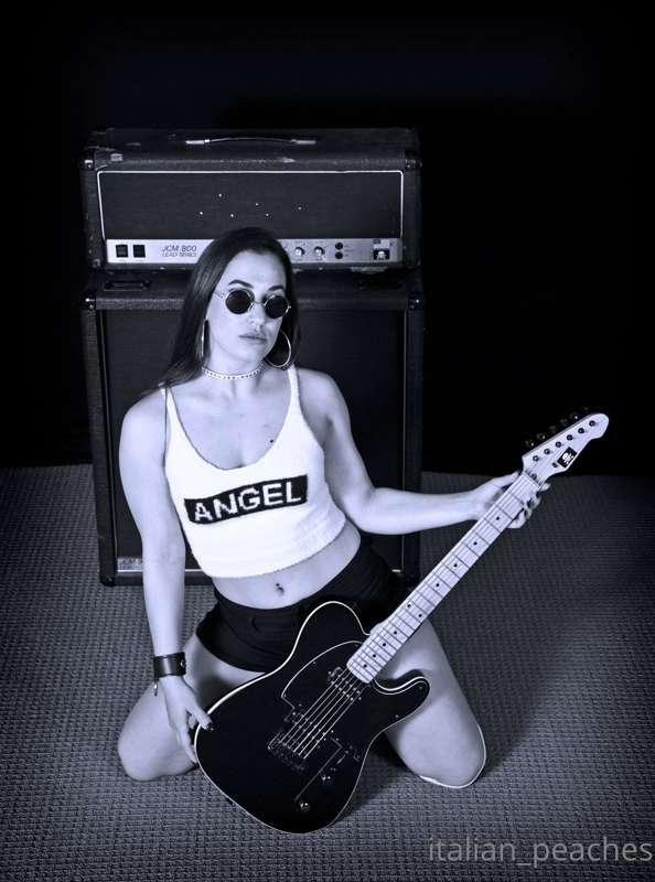 I did a fun & edgy photoshoot with a man's guitar collection..