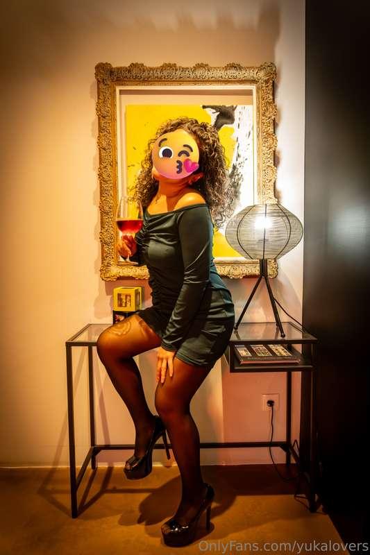 With a glass of wine in hand🥂, my green dress brushing my cu..