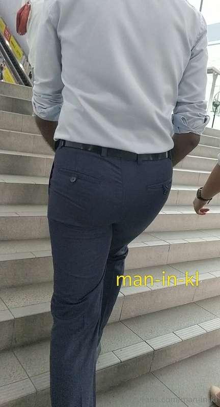 He looks so hot in that tight blue pants. This Indian exec i..