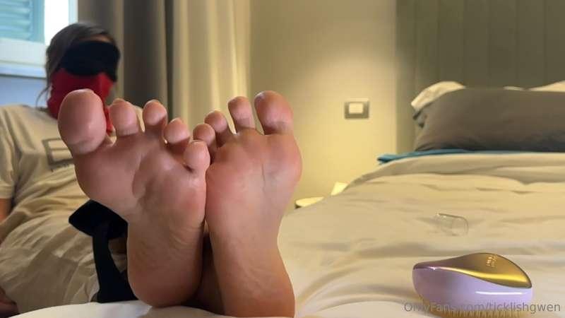 Armchair feet tickled
