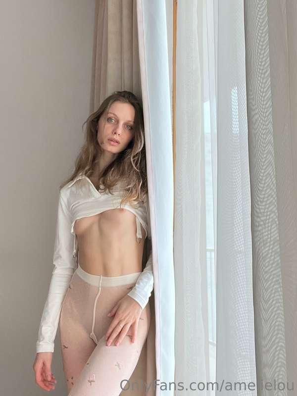 Playing with curtains...teasing new neighbors is always fun ..