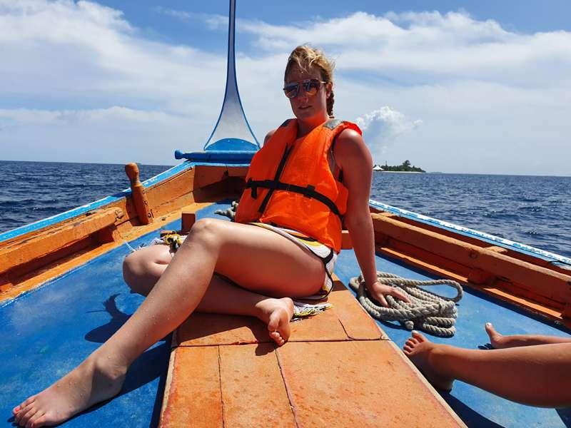 Thigh and Bare feet on show on a boat out at sea in the Indi..