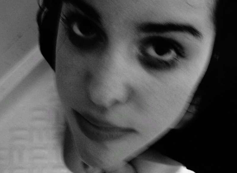 Expression, freckles, smeared makeup and distortion in the s..
