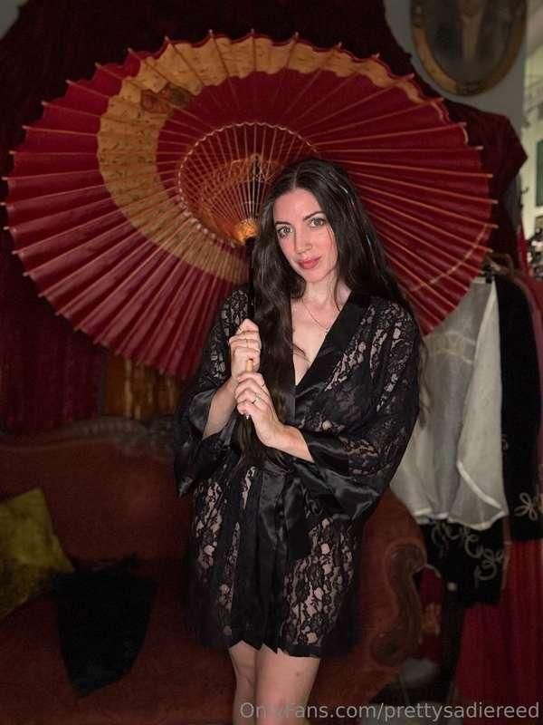 Bamboo-handled parasols, like the vintage one I’m holding he..
