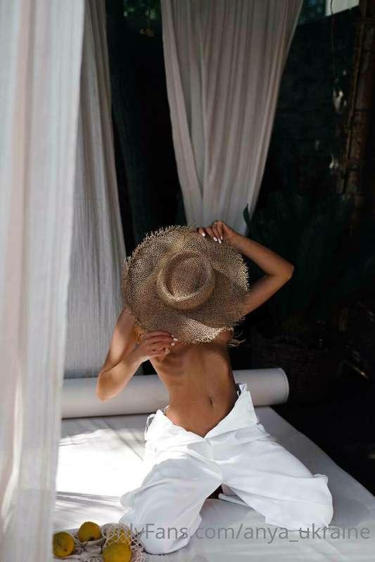 Сovered my beauty with a straw hat...
So don't peek at me, b..