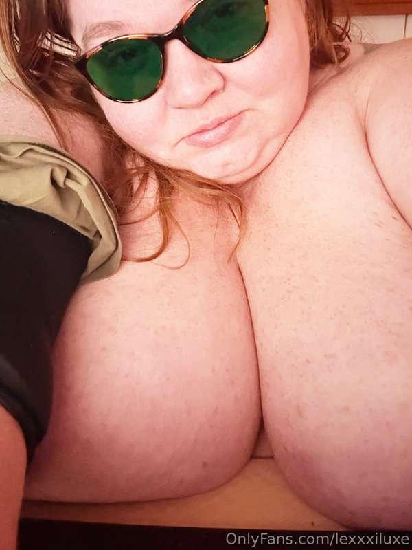 Day 2 of migraine, please accept my boobs and migraine glass..