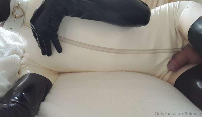 White latex with some angel wings and a pretty little dick >..