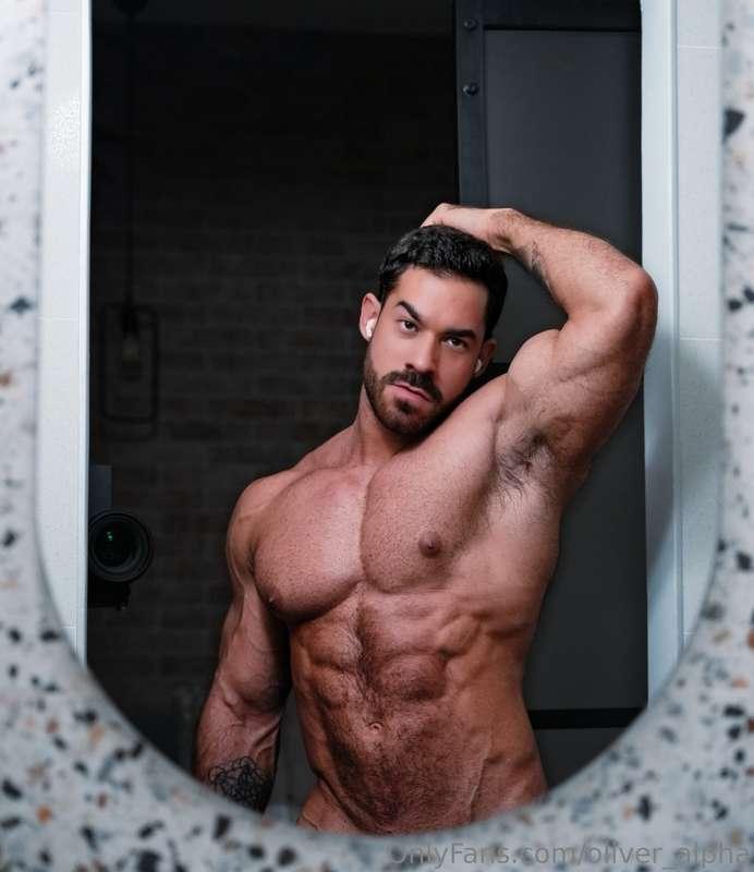 Flexing hard, abs cut deep, cock just waiting how long do yo..