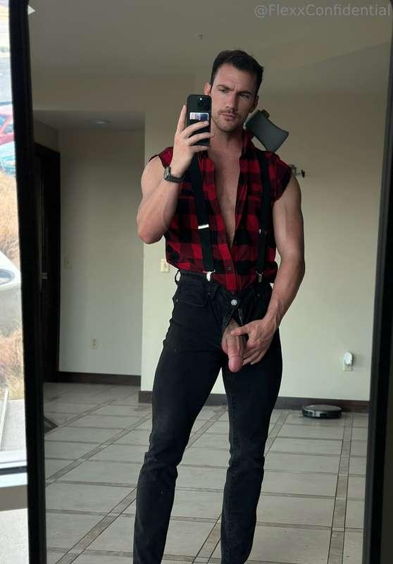 This lumberjack is ready to swing his axe 