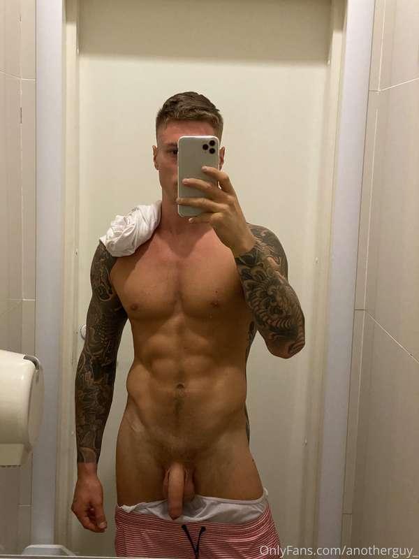 In a gym with pumped pecs