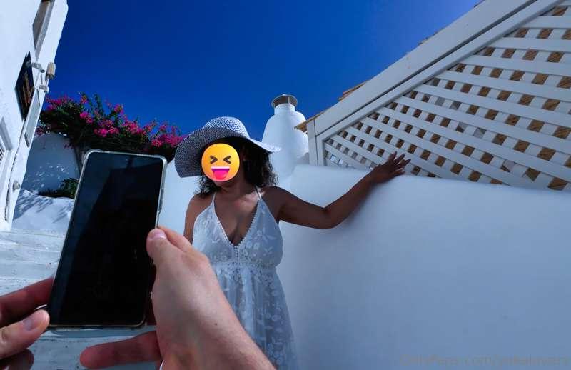 Walking through Santorini, the breeze caresses my skin and I..