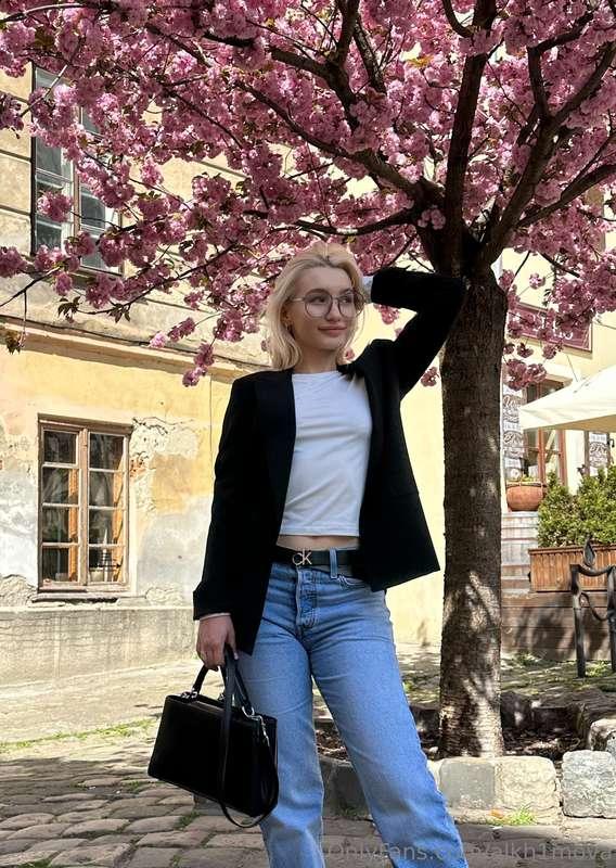 A cozy spring day under a beautifully blooming village tree,..