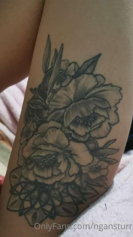 Thigh tattoo