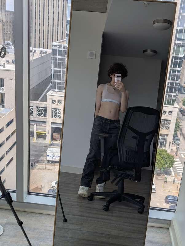 These jeans barely holding on… wanna help me take them off? ..