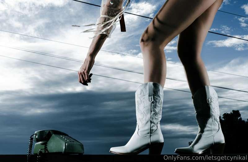 Here I am, balancing on the deck railing! It's a 30 foot dro..