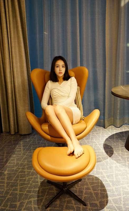on the wingback chair and ottoman