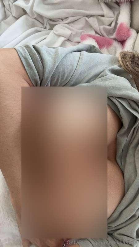Laying in bed… shirt lifted… boobs out… like I forgot how go..