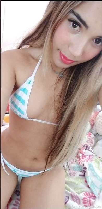 Loli stripping off tiny bikini for you..