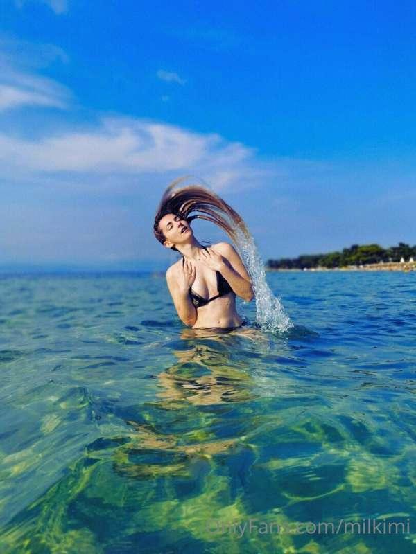 Playing in the water, who wants to play with me?