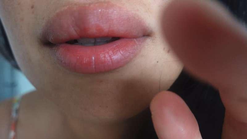 Touching you with my feet while I show my tongue