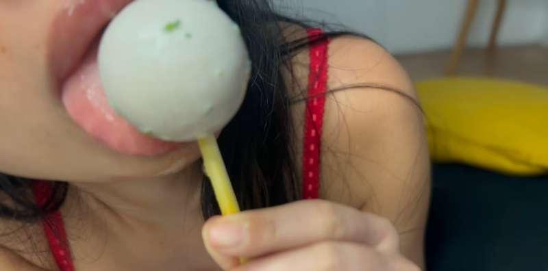 Asmr licking a round lollipop