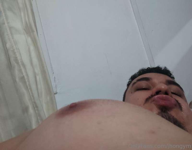 Suck my nipples, bite me!
Zoom in on the photo and watch the..