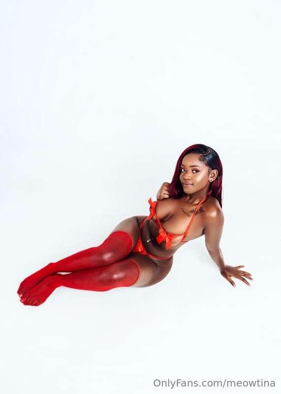 Red velvet, wet secrets, and a smile that says “come closer...