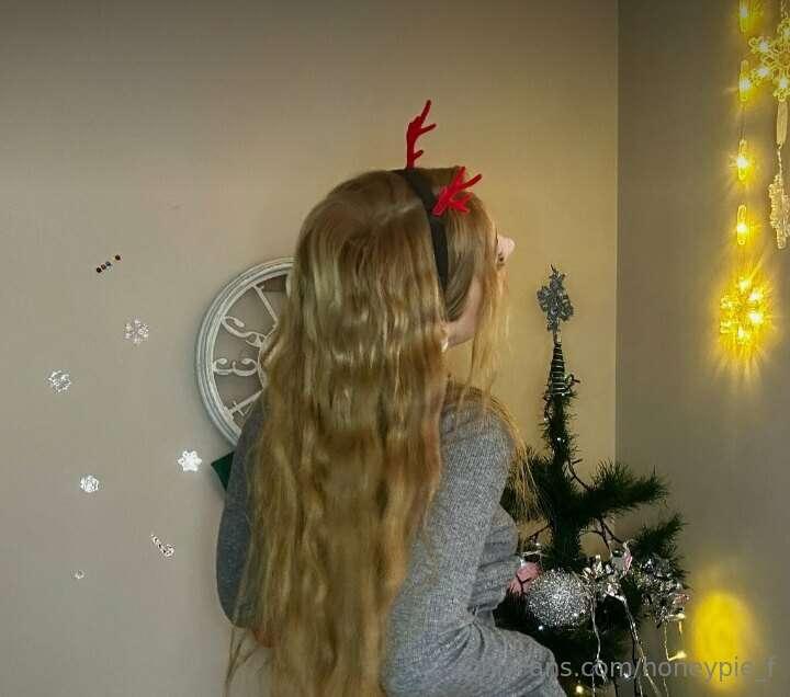 Wrapped in the soft glow of holiday lights and adorned with ..