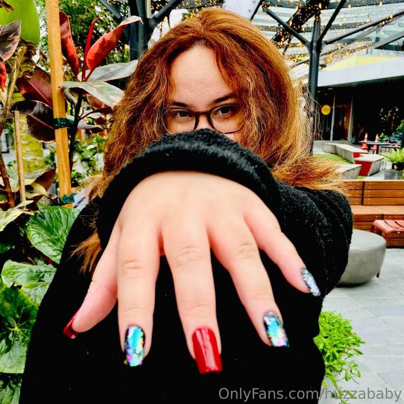 Hand pics with fancy cool hand painted nail art. Fancy finge..