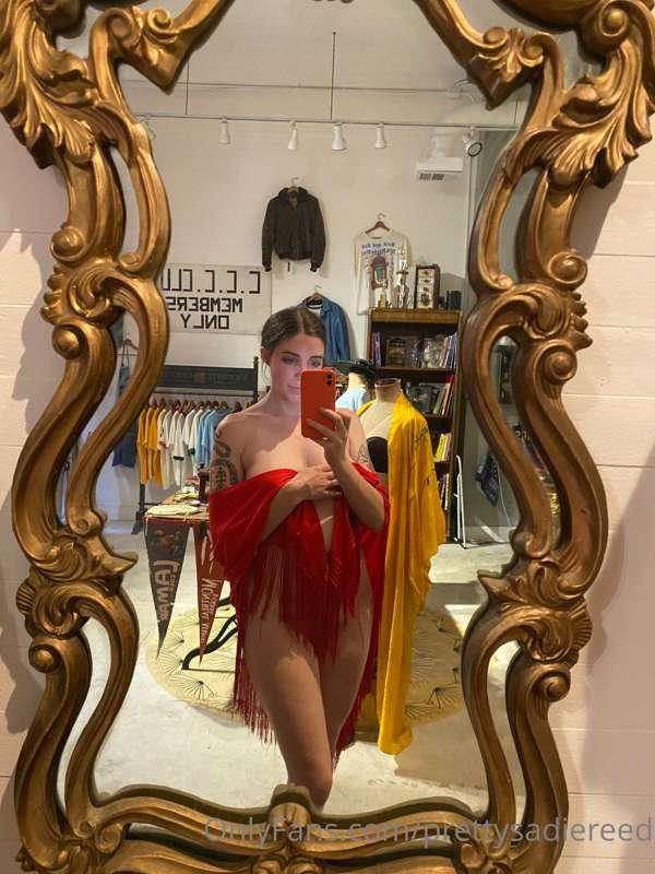 A 1970s nylon embroidered fringe shawl came into the shop. E..