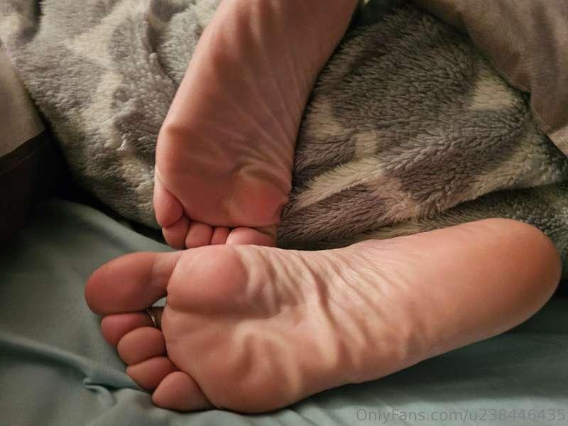 Tucked in and teasing…Soft soles. Warm sheets. Dirty thought..