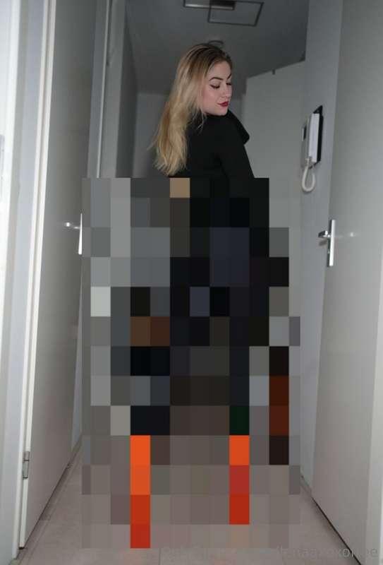 Styling an all Black Outfit with Orange Pleaser Heels is pre..