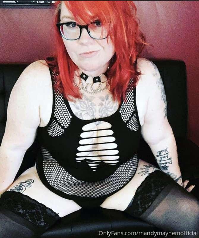 Thigh high stockings, tattoos and a kinky attitude. 😉