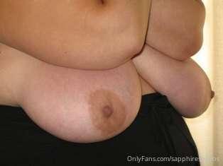 Tits popping out of a tank!