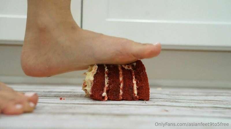 Full length video of walking over a piece of red velvet cake..