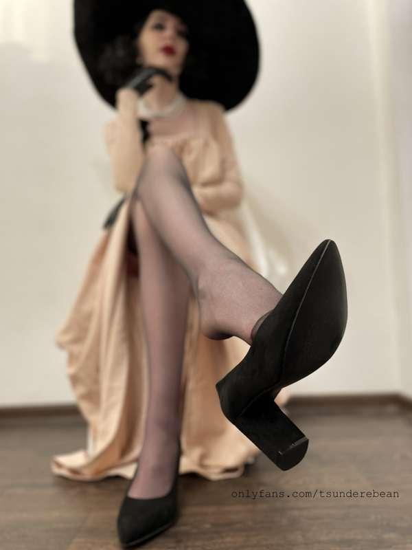 Tall Vampire Lady's nylon feet. Swipe to to take off her sho..