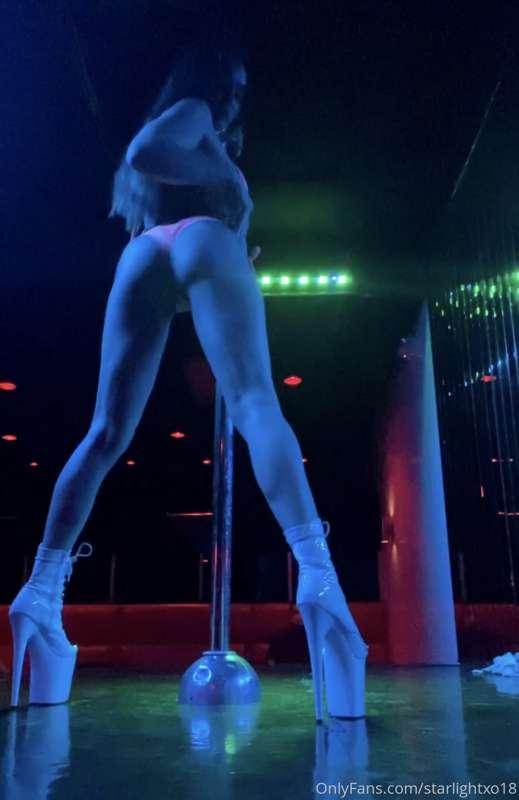 In the strip club. Watch me dance for you. Sexy little strip..