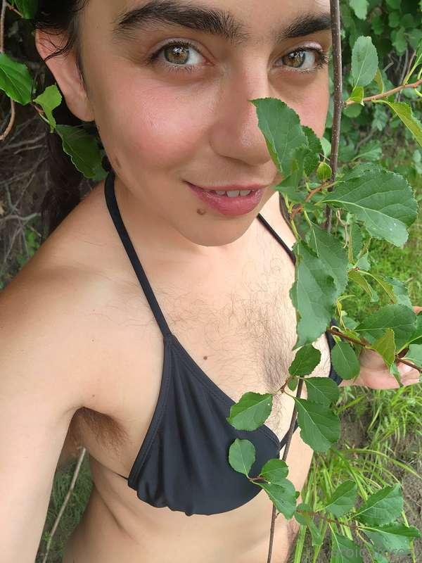 Peeking at you through the vines with mischief in my eyes 🌿😏