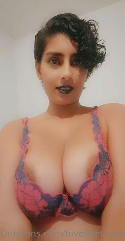 Trying on the second lingerie set with some black lipstick, ..