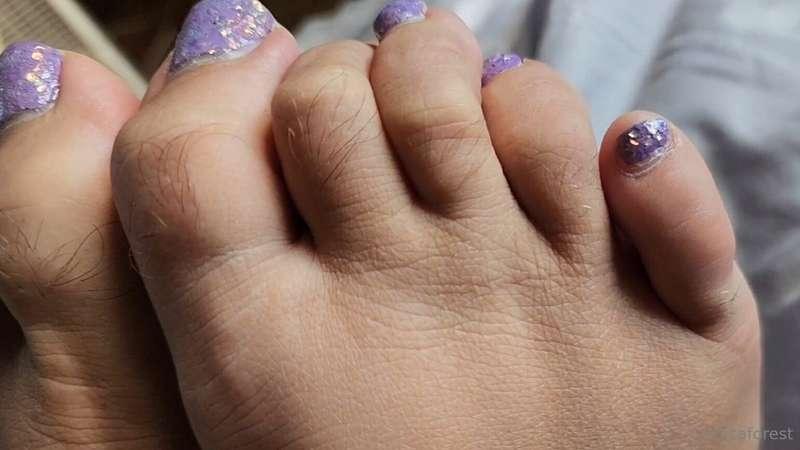 Lots of detailed close ups of my furry toes and feet in my n..
