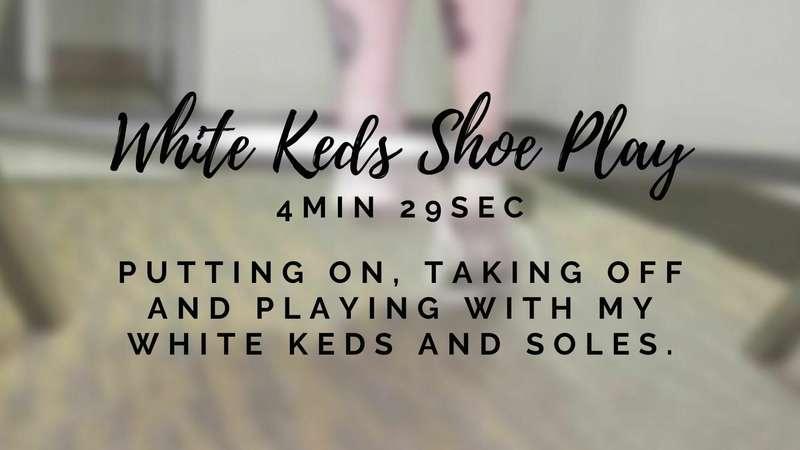 Putting on, taking off and playing with my white keds and so..