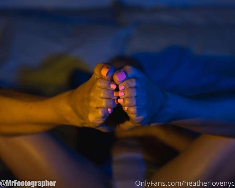 Playing in the dark with a pink pedi.