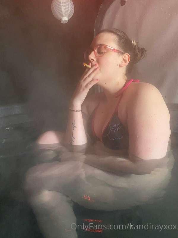 Sitting, relaxing, smoking a joint in a hot tub. Maybe also ..